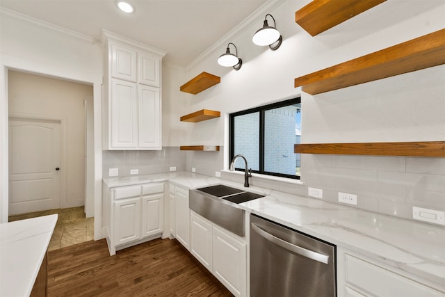 kitchen featuring white cabinets, ornamental molding, dishwasher, dark hardwood / wood-style floors, and light stone counters