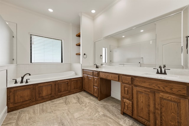 bathroom with vanity, ornamental molding, and a washtub