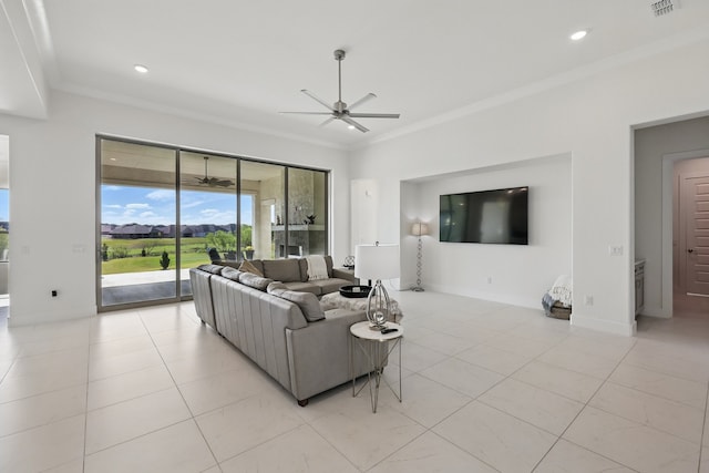 living area featuring crown molding, light tile patterned flooring, and ceiling fan