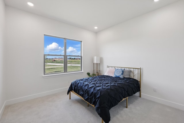 bedroom with recessed lighting, carpet floors, and baseboards