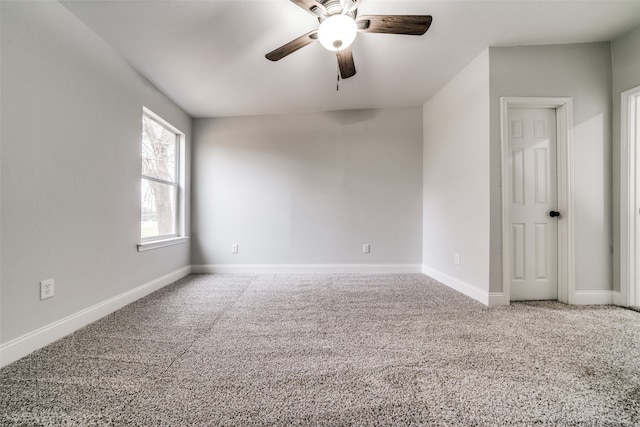 unfurnished room with carpet flooring and ceiling fan