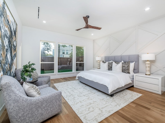 bedroom featuring hardwood / wood-style flooring and ceiling fan