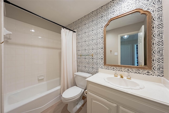 bathroom with vanity, toilet, wallpapered walls, and shower / tub combo with curtain