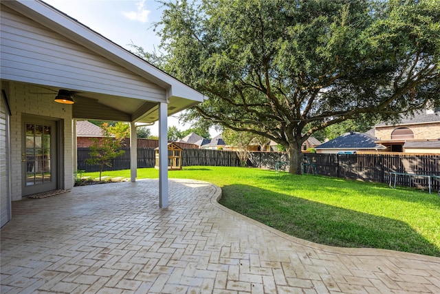 view of yard with a fenced backyard and a patio area