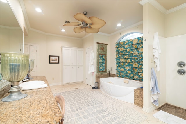 bathroom with ornamental molding, a tub, and tile patterned floors