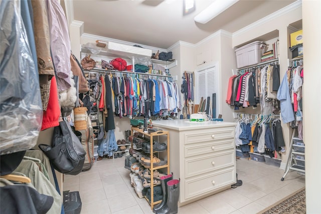 spacious closet with light tile patterned floors