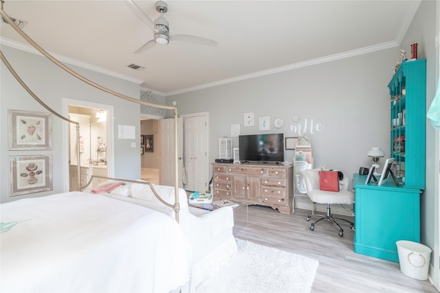 bedroom featuring ornamental molding, ceiling fan, a closet, and light hardwood / wood-style flooring