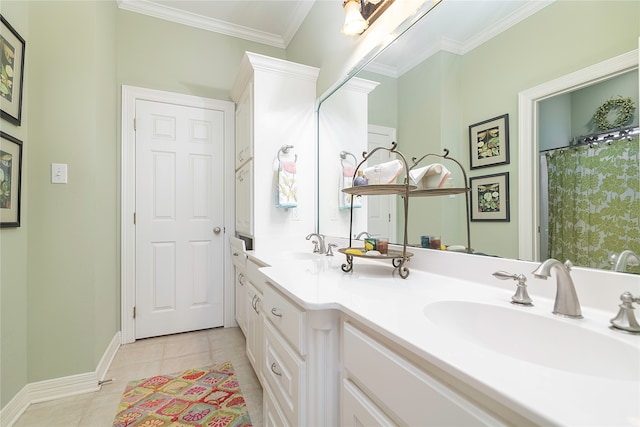 bathroom with vanity, ornamental molding, and tile patterned floors