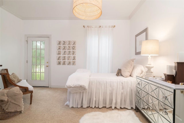 bedroom featuring access to exterior, crown molding, and carpet