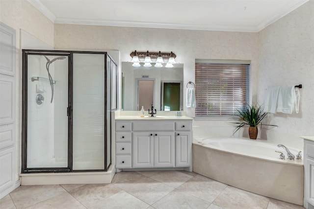 bathroom featuring tile patterned floors, vanity, ornamental molding, and shower with separate bathtub