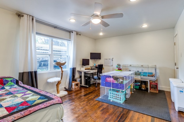 bedroom featuring ceiling fan and dark hardwood / wood-style floors