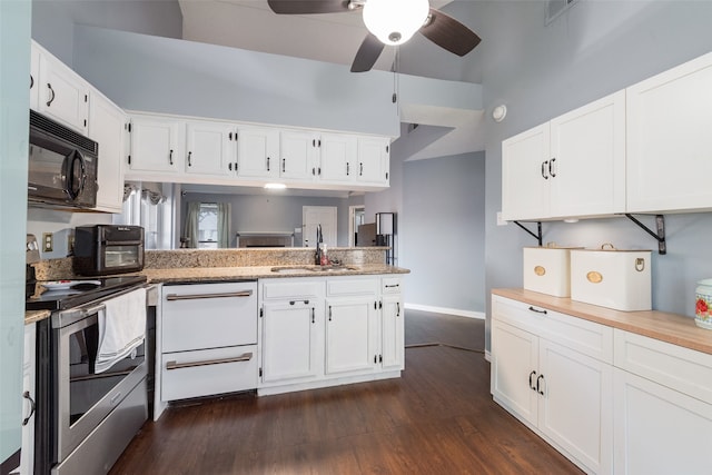 kitchen featuring white cabinets, stainless steel electric stove, dark hardwood / wood-style floors, and kitchen peninsula