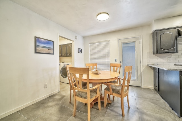 dining area featuring washing machine and clothes dryer