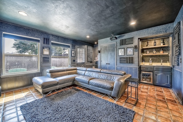 living room with sink and beverage cooler