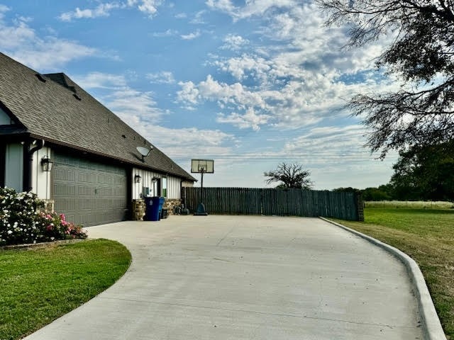 view of patio / terrace with a garage