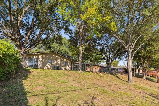 view of yard featuring central AC