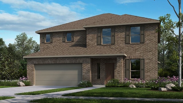 view of front of home with a garage and a front lawn