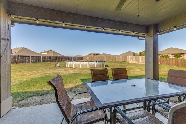 view of patio featuring a fenced in pool