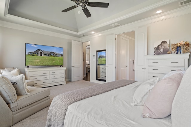 carpeted bedroom featuring high vaulted ceiling, a raised ceiling, ceiling fan, and crown molding