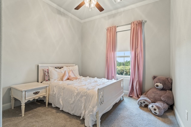 bedroom featuring ceiling fan, ornamental molding, and carpet flooring