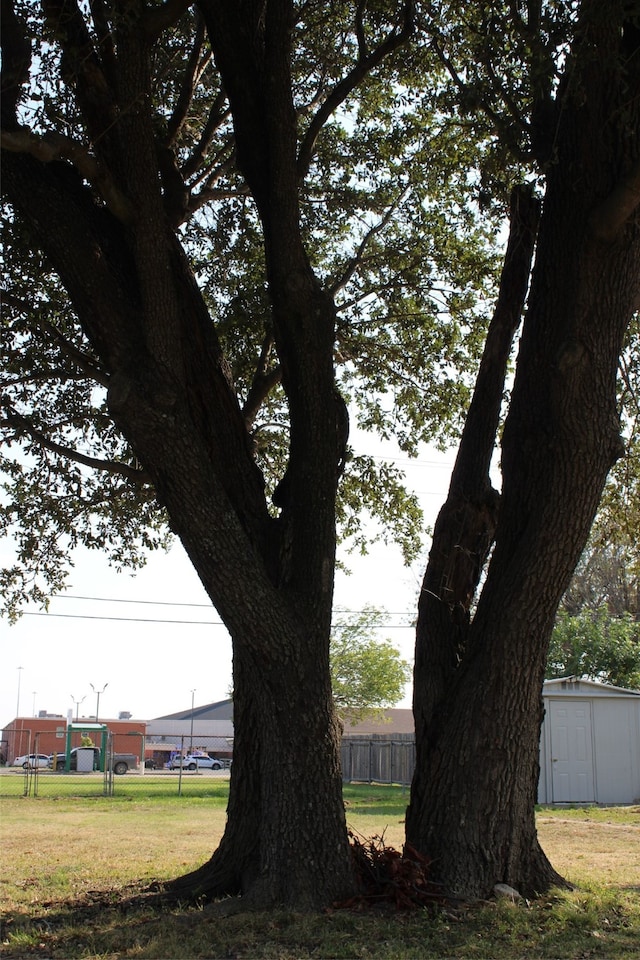 exterior space featuring a shed