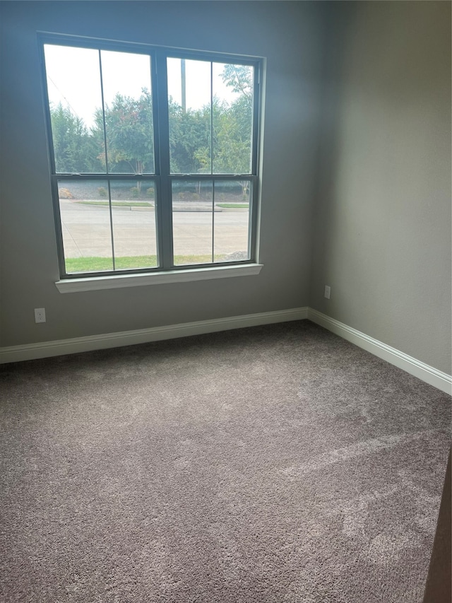 view of carpeted spare room