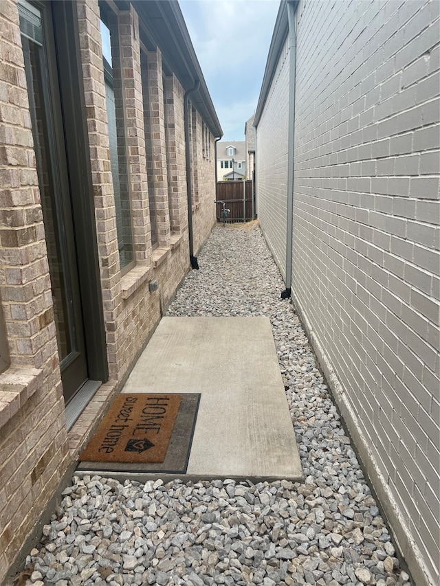 view of side of home featuring a patio