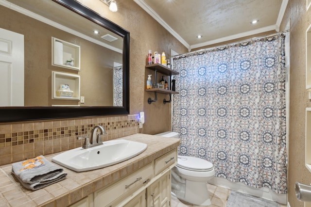 full bathroom featuring a textured wall, toilet, vanity, backsplash, and crown molding