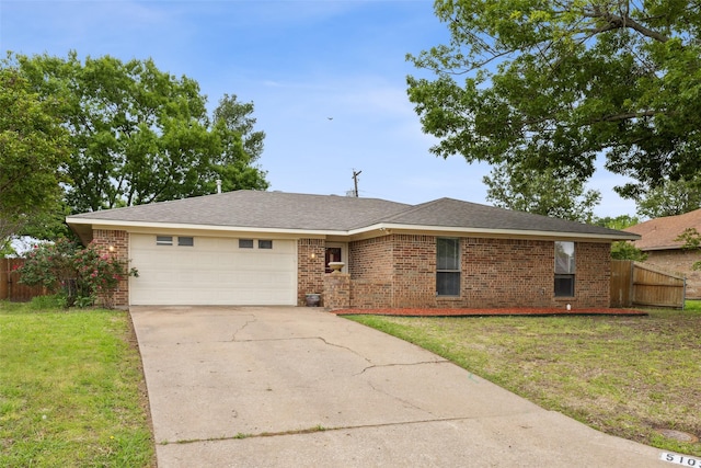 ranch-style house with a garage, a front yard, brick siding, and fence