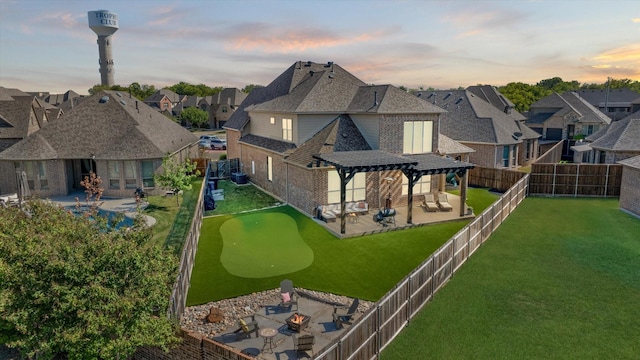 exterior space with a pergola, a patio area, and a yard