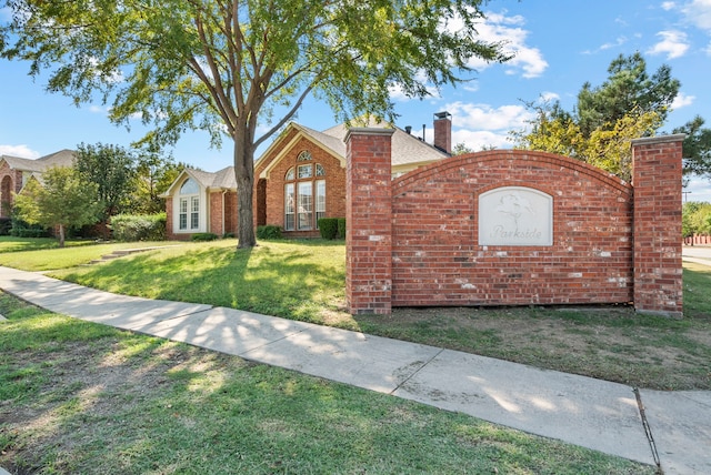 exterior space featuring a front lawn