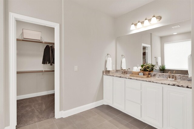 bathroom with separate shower and tub and tile patterned floors