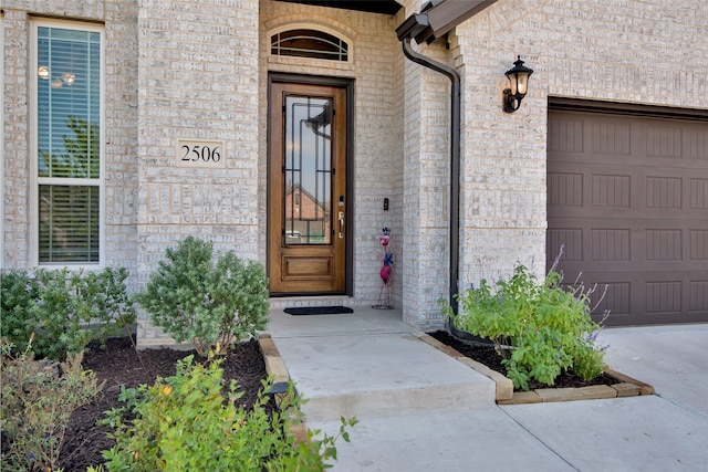 entrance to property featuring a garage