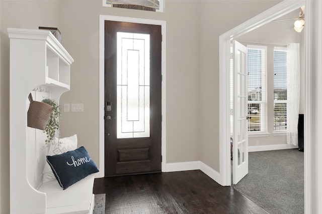 entryway with ceiling fan and dark hardwood / wood-style floors