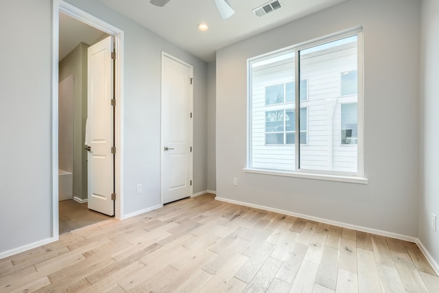 unfurnished bedroom featuring ceiling fan and light hardwood / wood-style floors