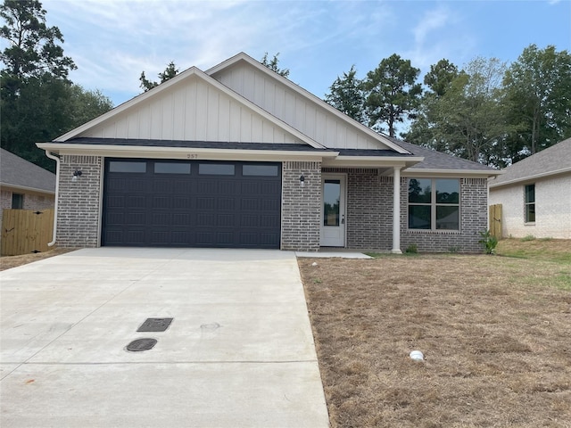 view of front facade featuring a garage and a front yard