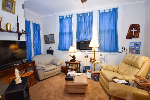 living room featuring crown molding and carpet