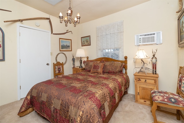 bedroom featuring light carpet, a chandelier, and a wall mounted air conditioner