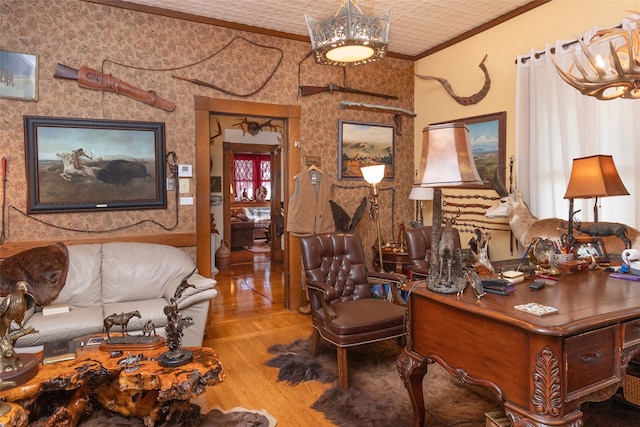 office with hardwood / wood-style floors, ornamental molding, and a wealth of natural light