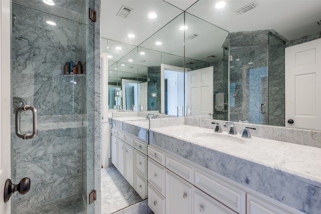 bathroom featuring vanity and walk in shower