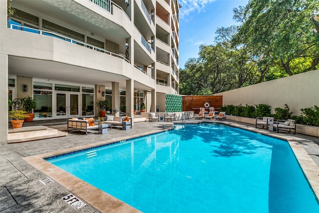 view of swimming pool with an outdoor hangout area and a patio area