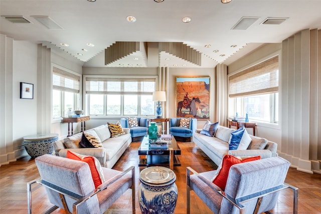 living room featuring hardwood / wood-style floors and vaulted ceiling