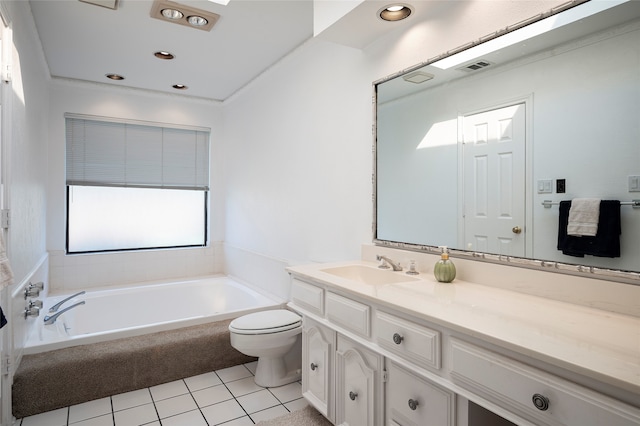 bathroom with a bath, tile patterned floors, vanity, and toilet