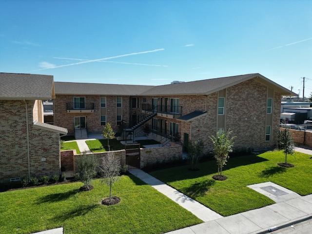 view of front of home with a front yard