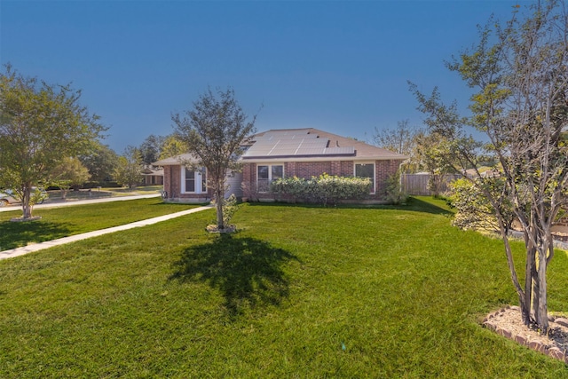 view of front facade with a front lawn