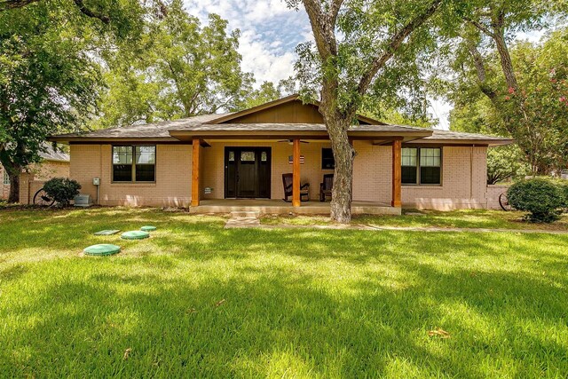 view of front of home with a front lawn