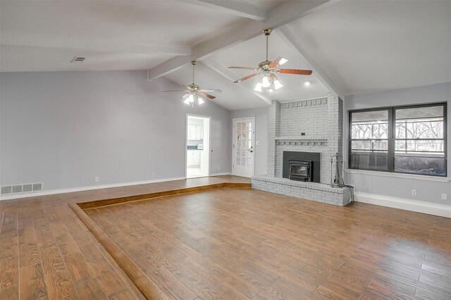 kitchen featuring white fridge, light tile patterned floors, white cabinets, and ceiling fan