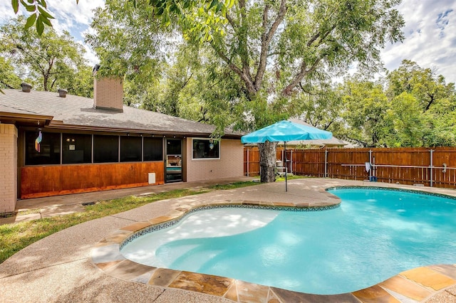 view of swimming pool featuring a patio