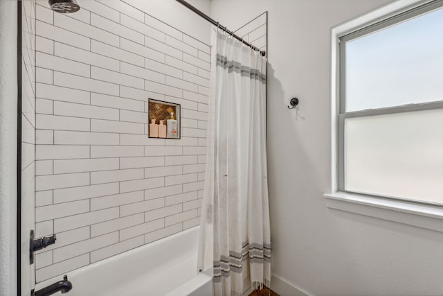 bathroom featuring shower / bath combination with curtain