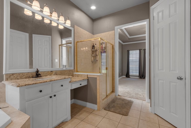 bathroom featuring vanity, tile patterned flooring, and an enclosed shower